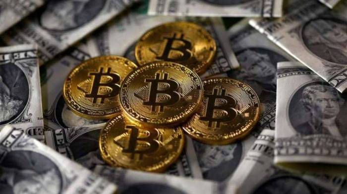 A 5000 Rupiah Indonesian Bank Note with a Golden Bitcoin Stock Image ...